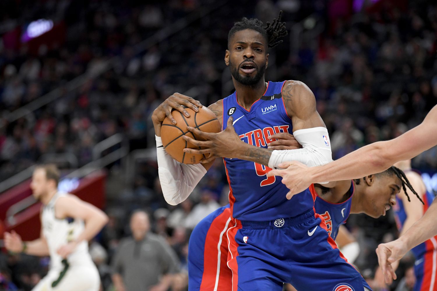 Detroit Pistons guard Nerlens Noel (9) pulls down a rebound against the Milwaukee Bucks in the third quarter at Little Caesars Arena.